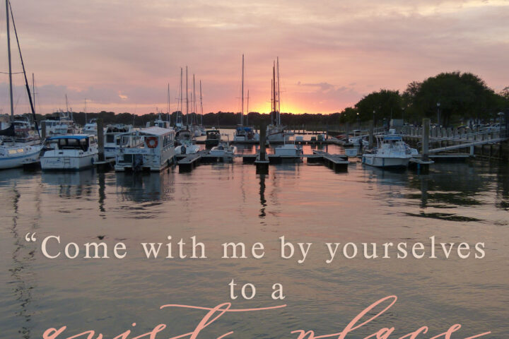 Sunset over a boat marina with sailboats and calm water; pastel sky and a Bible verse overlaid.